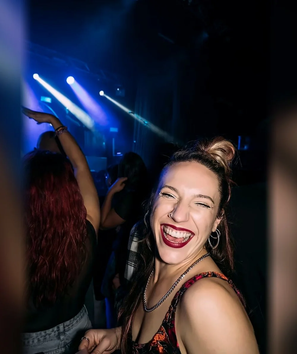A guest on the dance floor, mid-event